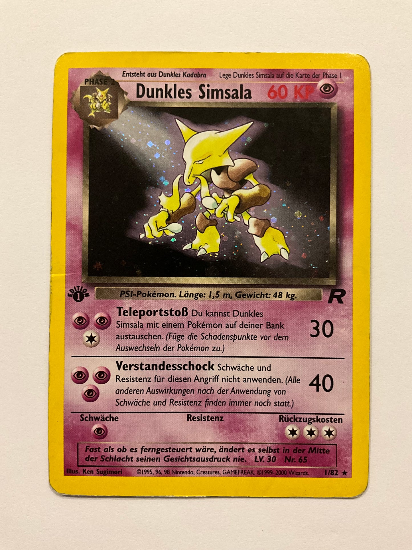 Dunkles Simsala Holo 1/82 Team Rocket LP DE