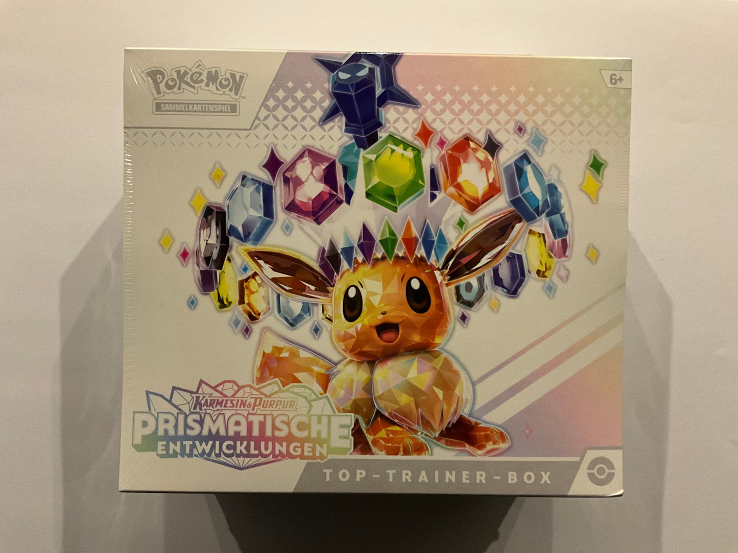Pokémon Prismatische Entwicklungen Top Trainer Box ETB Deutsch OVP Sealed TCG Sammelbox