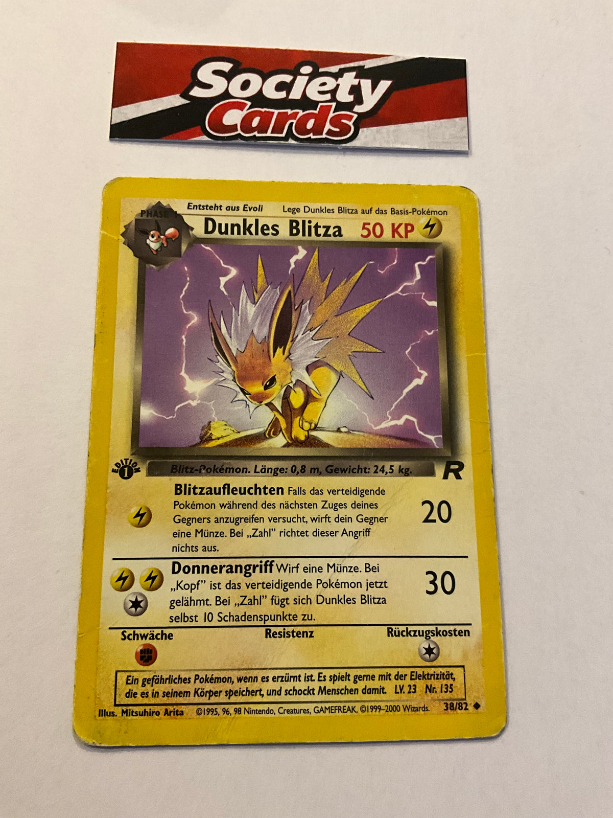 Pokémon Dunkles Blitza 38/82 – Team Rocket 1. Edition (Deutsch)